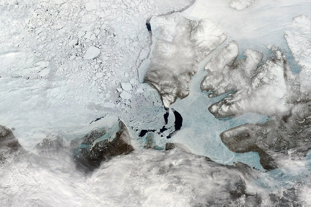 Ship in sea ice among Canadian Arctic islands